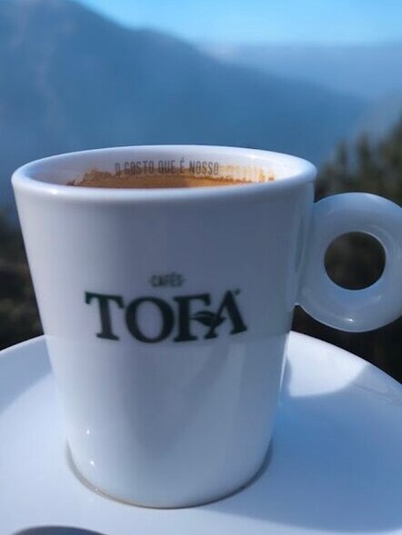 Espresso from Cafés TOFA with the valley behind
